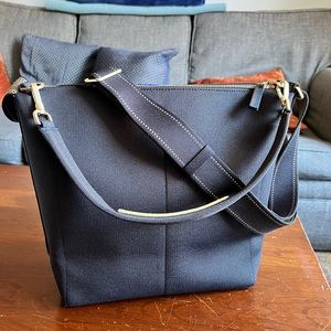 Rothy’s The Mini Zip Bucket, Ink and Ivory.